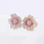 Wholesale luxury zircon earrings with flower and leopard designs on real gold plated copper from JuneJewelry.com – premium fashion jewelry for bulk buyers.