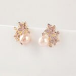 Wholesale flower pearl earrings with shimmering cubic zirconia petals and 925 silver needles from JuneJewelry.com – elegant floral jewelry for bulk purchase.