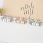 Wholesale flower pearl earrings with shimmering cubic zirconia petals and 925 silver needles from JuneJewelry.com – elegant floral jewelry for bulk purchase.