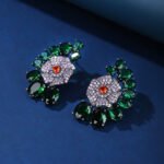 Wholesale floral zircon earrings with colorful red and yellow stones on gold plated copper from JuneJewelry.com – unique flower jewelry for bulk orders.