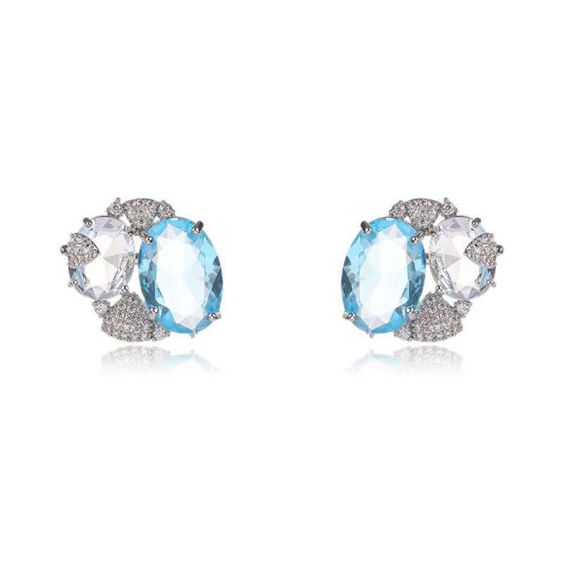 Wholesale blue zircon earrings with sky-blue oval stones and 925 silver needles from JuneJewelry.com – luxury nautical fashion jewelry for bulk buyers.