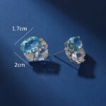 Wholesale blue zircon earrings with sky-blue oval stones and 925 silver needles from JuneJewelry.com – luxury nautical fashion jewelry for bulk buyers.
