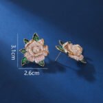 Wholesale floral zircon earrings featuring rose and blossom designs on real gold plated copper from JuneJewelry.com – luxury fashion jewelry for bulk orders.