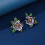 Wholesale floral zircon earrings featuring rose and blossom designs on real gold plated copper from JuneJewelry.com – luxury fashion jewelry for bulk orders.