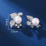 Wholesale floral pearl earrings with cubic zirconia petals and 925 silver needles from JuneJewelry.com – elegant flower jewelry for bulk orders.