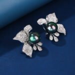 Wholesale floral pearl earrings with cubic zirconia petals and 925 silver needles from JuneJewelry.com – elegant flower jewelry for bulk orders.