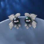 Wholesale floral pearl earrings with cubic zirconia petals and 925 silver needles from JuneJewelry.com – elegant flower jewelry for bulk orders.