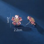 Wholesale pink zircon earrings with heart-shaped petals and 925 silver pins on gold plated copper from JuneJewelry.com – romantic flower jewelry for bulk orders.