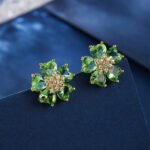 Wholesale pink zircon earrings with heart-shaped petals and 925 silver pins on gold plated copper from JuneJewelry.com – romantic flower jewelry for bulk orders.