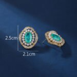 Wholesale vintage pearl earrings with pink oval stone and zircon halo on gold plated copper from JuneJewelry.com – luxury boutique jewelry.