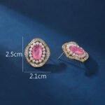 Wholesale vintage pearl earrings with pink oval stone and zircon halo on gold plated copper from JuneJewelry.com – luxury boutique jewelry.