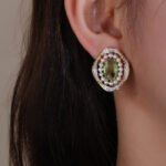 Wholesale vintage pearl earrings with pink oval stone and zircon halo on gold plated copper from JuneJewelry.com – luxury boutique jewelry.