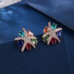 Wholesale starfish zircon earrings with multi-colored oval stones and 925 silver needles from JuneJewelry.com – unique coastal fashion jewelry for bulk purchase.