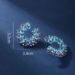 Wholesale yellow zircon hoop earrings with pink accents on real gold plated copper from JuneJewelry.com – luxury fashion jewelry for bulk buyers.