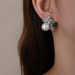 Wholesale floral pearl earrings with multicolored cubic zirconia and 925 silver needles from JuneJewelry.com – luxury jewelry for bulk orders.