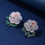 Wholesale flower zircon earrings with white pave petals on real gold plated copper from JuneJewelry.com – luxury floral jewelry for bulk orders.