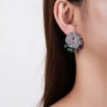 Wholesale flower zircon earrings with white pave petals on real gold plated copper from JuneJewelry.com – luxury floral jewelry for bulk orders.