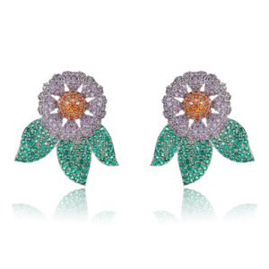 Wholesale zircon flower earrings with white pavé petals on real gold plated copper from JuneJewelry.com – luxury floral studs for bulk orders.