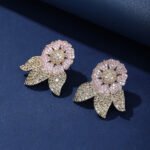 Wholesale zircon flower earrings with white pavé petals on real gold plated copper from JuneJewelry.com – luxury floral studs for bulk orders.