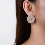 Wholesale red heart earrings with white zircon flower petals and 925 silver pins from JuneJewelry.com – luxury bridal jewelry for bulk orders.