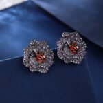 Wholesale floral zircon earrings with white pavé petals on real gold plated copper from JuneJewelry.com – luxury blossom studs for bulk orders.