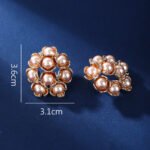 Wholesale shell pearl earrings with zircon stones and gold plated copper floral design from JuneJewelry.com – 925 silver needle fashion jewelry for bulk buyers.