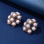 Wholesale shell pearl earrings with zircon stones and gold plated copper floral design from JuneJewelry.com – 925 silver needle fashion jewelry for bulk buyers.