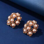 Wholesale shell pearl earrings with zircon stones and gold plated copper floral design from JuneJewelry.com – 925 silver needle fashion jewelry for bulk buyers.