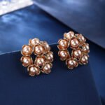 Wholesale shell pearl earrings with zircon stones and gold plated copper floral design from JuneJewelry.com – 925 silver needle fashion jewelry for bulk buyers.
