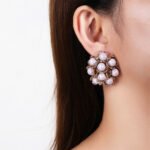 Wholesale shell pearl earrings with zircon stones and gold plated copper floral design from JuneJewelry.com – 925 silver needle fashion jewelry for bulk buyers.