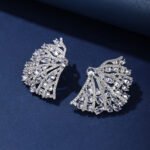 Wholesale pink flower earrings with central yellow zircon and 925 silver needles from JuneJewelry.com – unique floral brass jewelry for bulk buyers.