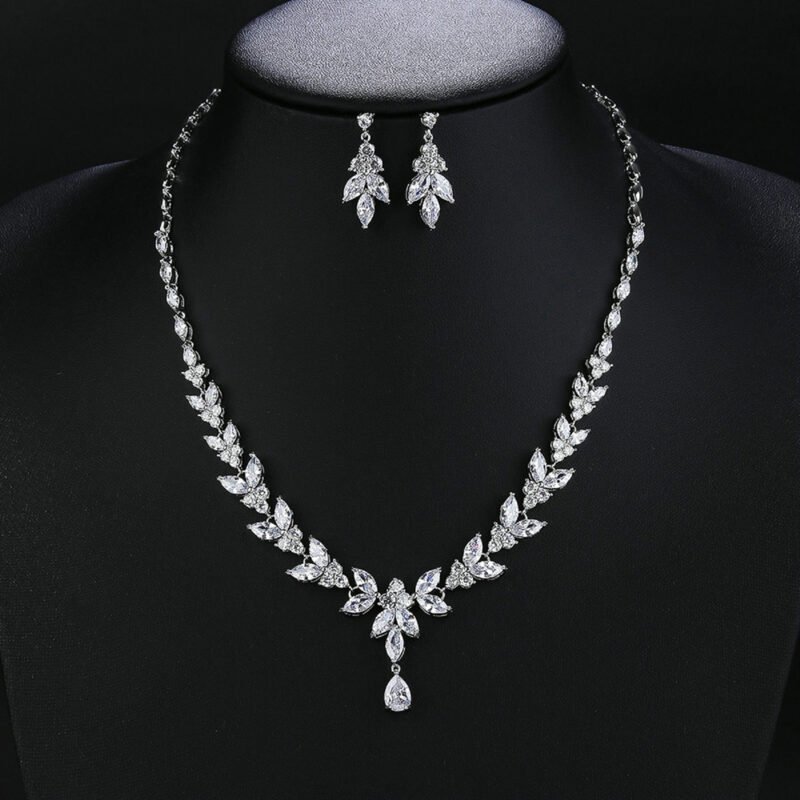 Wholesale bridal zircon set featuring a luxury teardrop pendant necklace and matching earrings in real platinum plated copper from JuneJewelry.com.