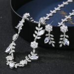 Wholesale leaf zircon set with sparkling marquise stones on real gold plated copper from JuneJewelry.com – unique floral jewelry for bulk purchase.