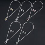 Wholesale zircon jewelry set with necklace and S925 silver needle earrings in real gold plated copper from JuneJewelry.com – premium bridal jewelry for bulk orders.