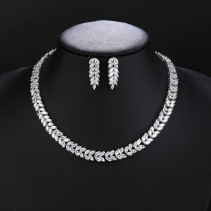 Wholesale bridal zircon set featuring intricate floral and leaf designs on real gold plated copper from JuneJewelry.com – luxury wedding jewelry for bulk buyers.