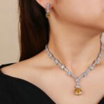 Wholesale luxury zircon set with necklace and S925 silver needle earrings in gold plated copper from JuneJewelry.com – high-quality bridal jewelry for bulk orders.