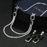 Wholesale luxury zircon set with necklace, S925 silver needle earrings, and emerald accents from JuneJewelry.com – high-quality gold plated bridal jewelry for bulk orders.