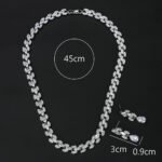 Wholesale copper zircon set featuring marquise-cut white stones and real gold plating from JuneJewelry.com – premium bridal jewelry for bulk orders.