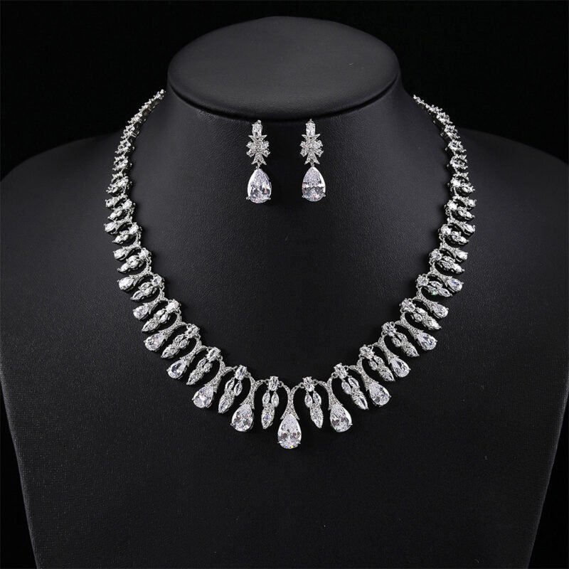 Wholesale copper zircon jewelry set with real Platinum plating and marquise-cut white stones from JuneJewelry.com – luxury bridal accessories for bulk orders.