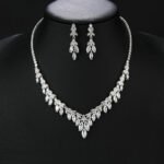 Wholesale copper zircon set with marquise stones and real gold plating from JuneJewelry.com – luxury bridal jewelry for bulk orders.