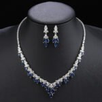 Wholesale copper zircon set with marquise stones and real gold plating from JuneJewelry.com – luxury bridal jewelry for bulk orders.