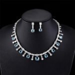 Wholesale luxury zircon set with gold plated copper and S925 silver needle earrings from JuneJewelry.com – premium bridal jewelry for bulk orders.