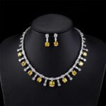 Wholesale luxury zircon set with gold plated copper and S925 silver needle earrings from JuneJewelry.com – premium bridal jewelry for bulk orders.
