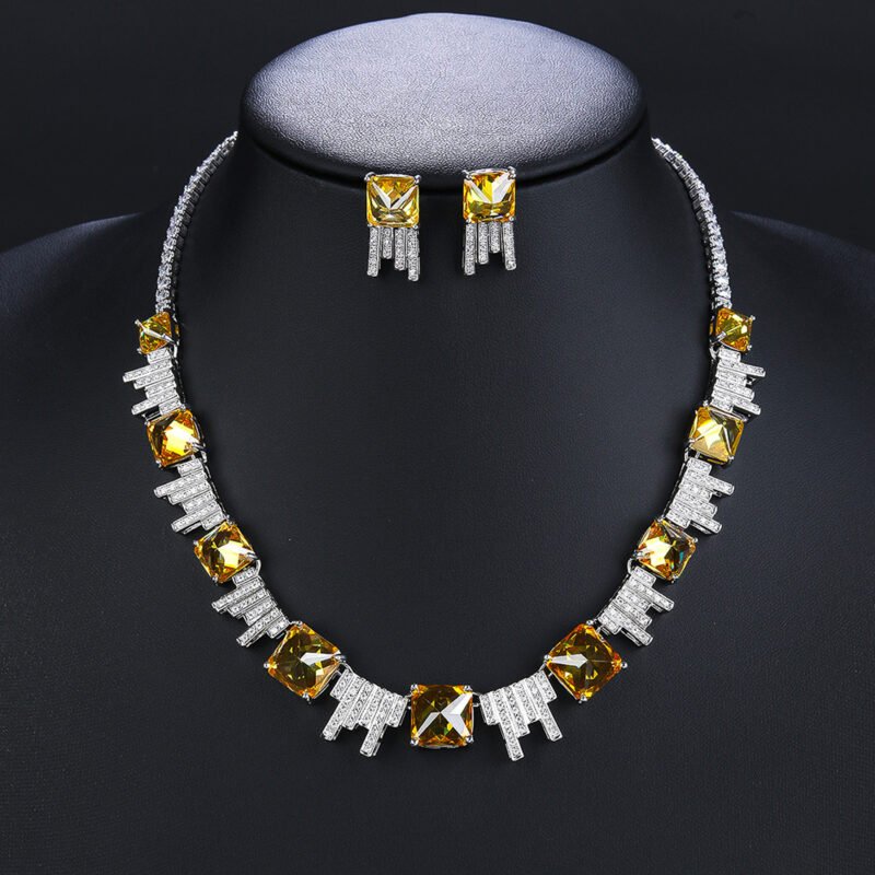 Wholesale luxury zircon set with yellow cushion-cut stones and gold plated copper from JuneJewelry.com – high-quality 925 silver needle bridal jewelry.