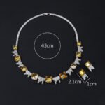 Wholesale luxury zircon set with yellow cushion-cut stones and gold plated copper from JuneJewelry.com – high-quality 925 silver needle bridal jewelry.