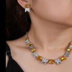 Wholesale luxury zircon set with yellow cushion-cut stones and gold plated copper from JuneJewelry.com – high-quality 925 silver needle bridal jewelry.
