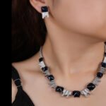 Wholesale luxury zircon set with yellow cushion-cut stones and gold plated copper from JuneJewelry.com – high-quality 925 silver needle bridal jewelry.