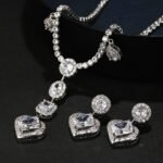 Wholesale Copper Zircon Jewelry set with heart drop necklace and matching earrings featuring 925 silver pins from JuneJewelry.com.