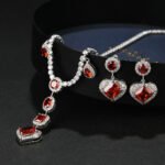 Wholesale Copper Zircon Jewelry set with heart drop necklace and matching earrings featuring 925 silver pins from JuneJewelry.com.