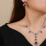 Wholesale Copper Zircon Jewelry set with heart drop necklace and matching earrings featuring 925 silver pins from JuneJewelry.com.